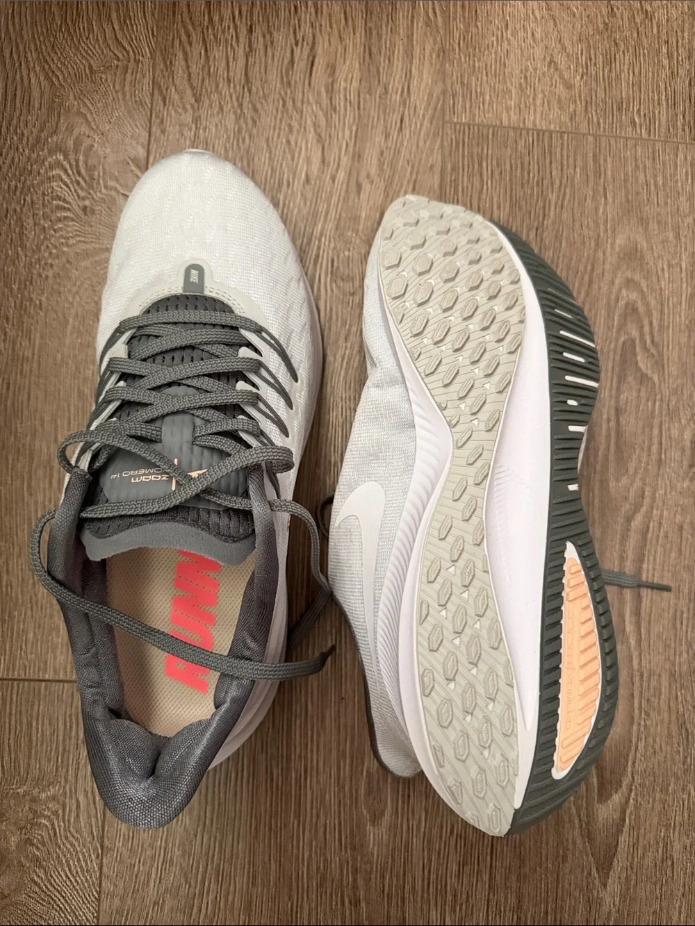 Nike WMNS Air Zoom Vomero 14 in Pure Platinum and Crimson Tint